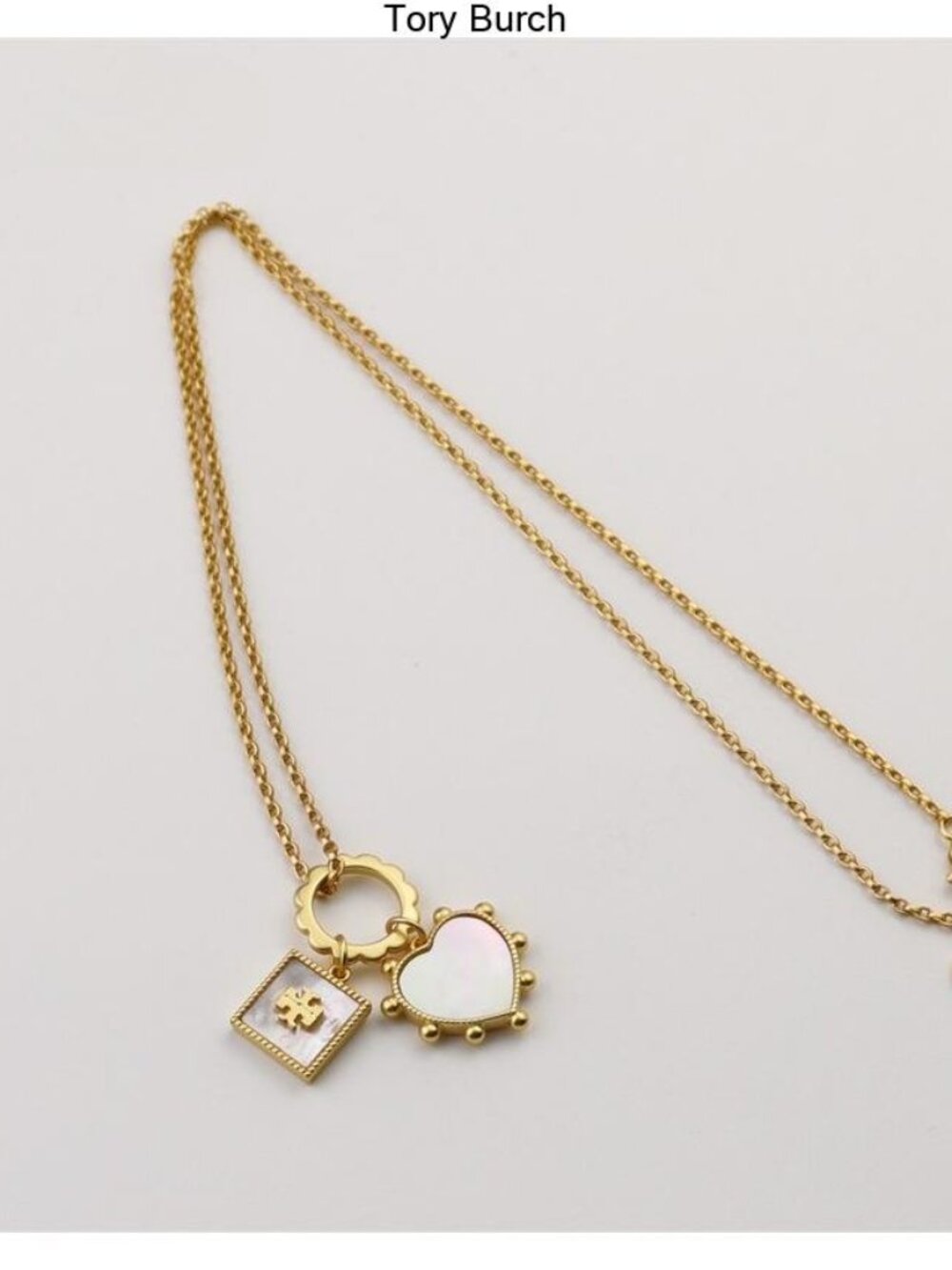 Tory Burch Gold Necklace with Mother-of-Pearl Heart and Logo Charms